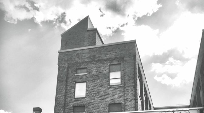 image of a brick building looking up